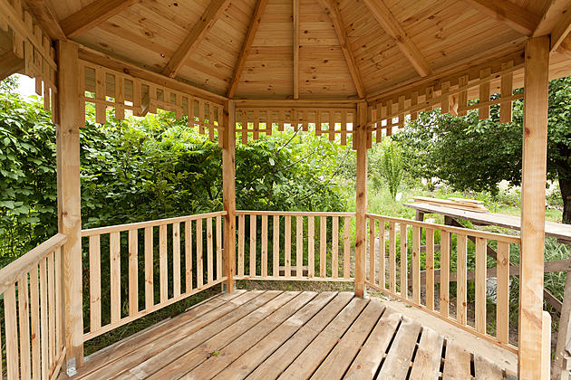 This image is of a beautiful wooden private gazebo.